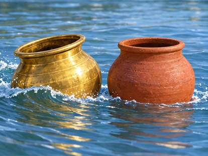 Small wave nudging brass pot near fragile clay rim without contact.